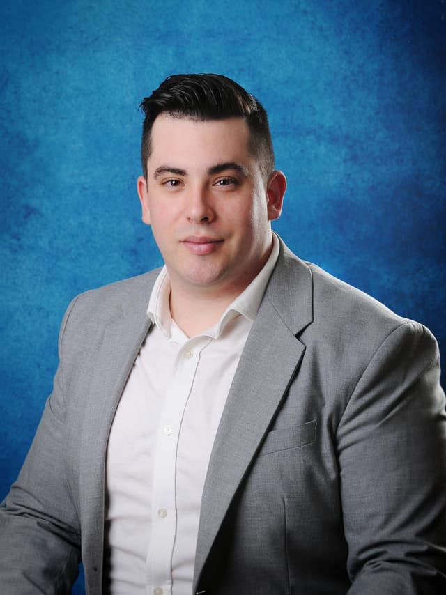 Professional portrait of Carlos San Miguel Ortega